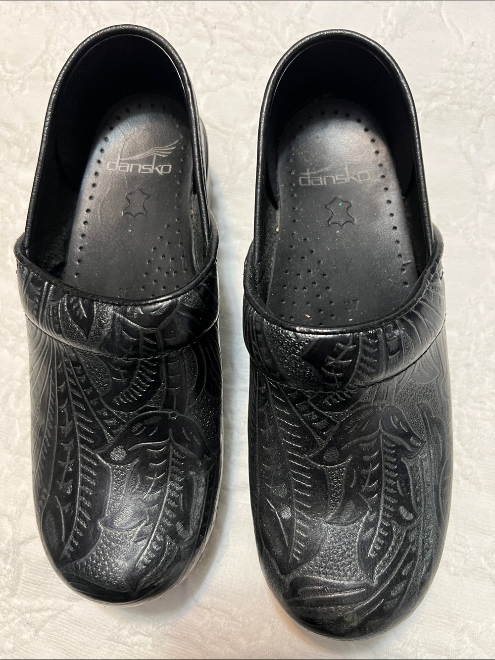 Dansko Black Embossed Leather Clogs